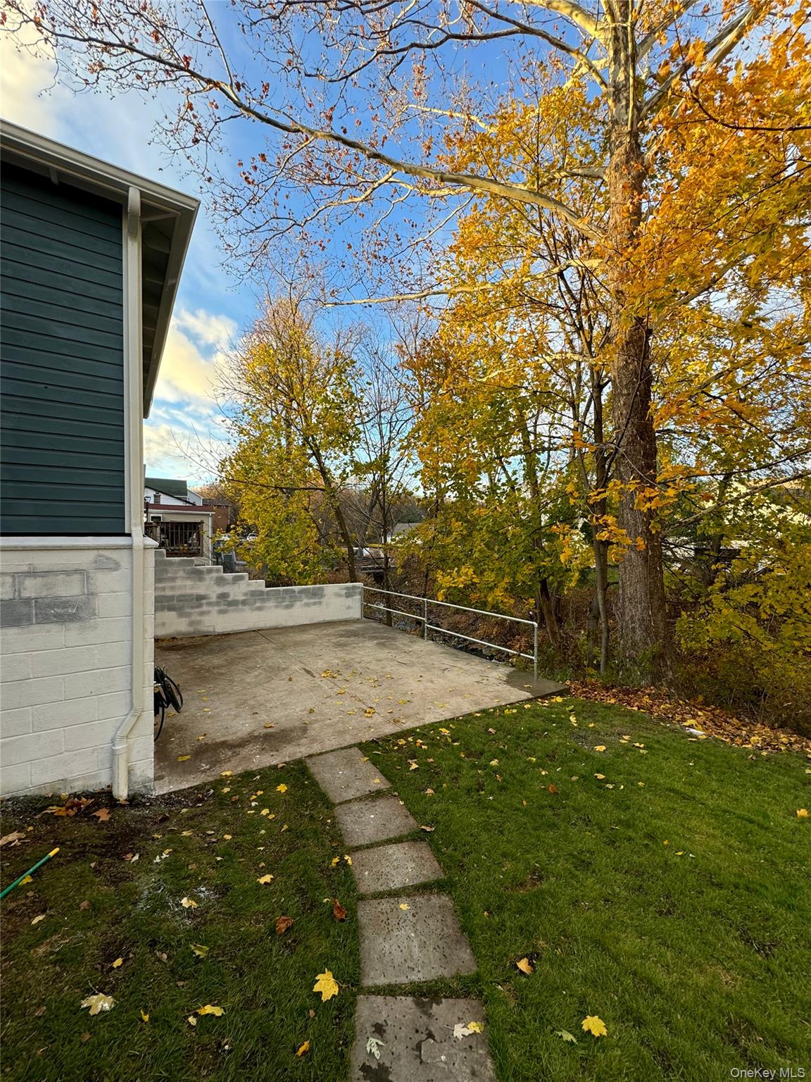 32 Western Avenue, Unit SUITE 3 Marlboro, NY 12542 - Photo 4 of 10 View of green lawn with a patio