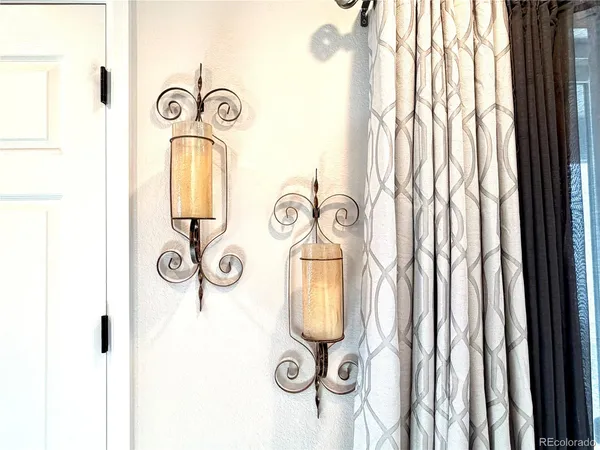 a bathroom with a mirror and a sink