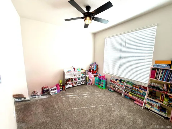 a room with toys and a chandelier