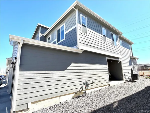 a view of a house with a garage