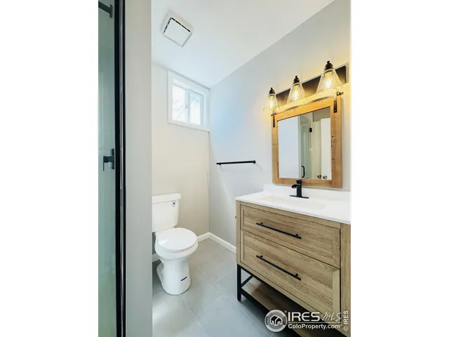 a bathroom with a sink and a shower