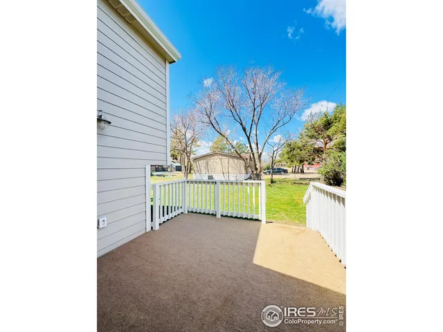 a view of a back yard of the house