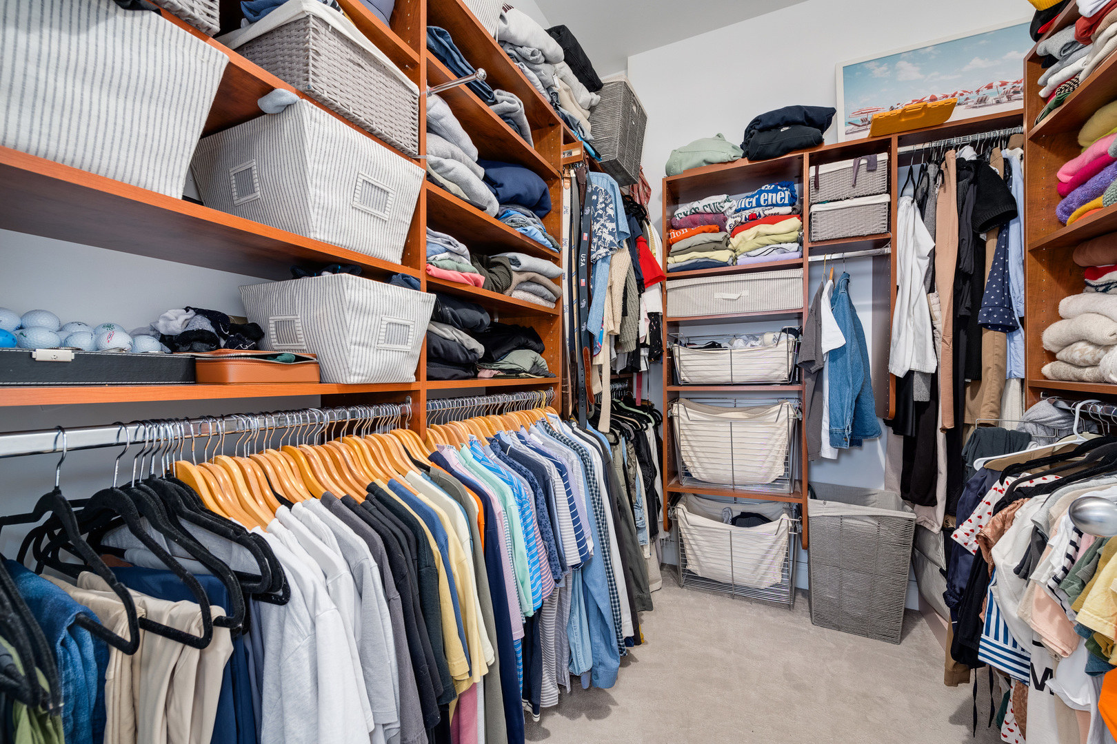 23 North Green Street, Unit 402 Chicago, IL 60607 - Photo 15 of 18 a view of walk in closet with clothes and shoes