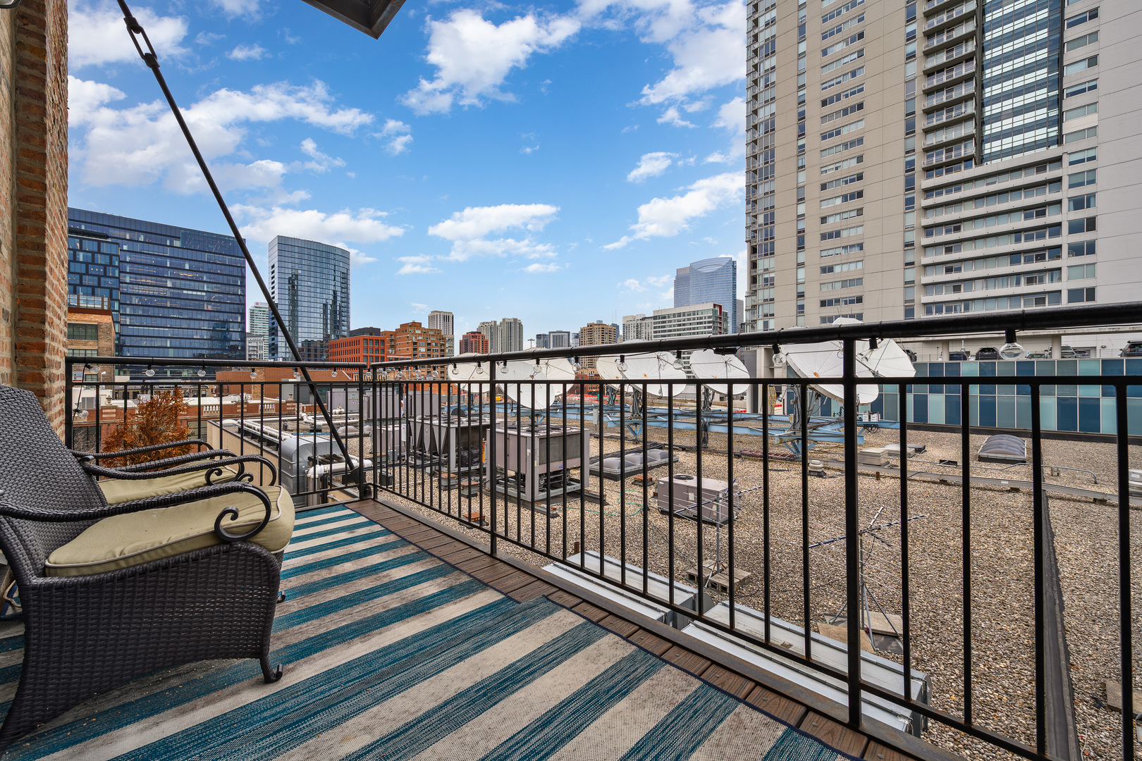 23 North Green Street, Unit 402 Chicago, IL 60607 - Photo 17 of 18 a view of city from a balcony
