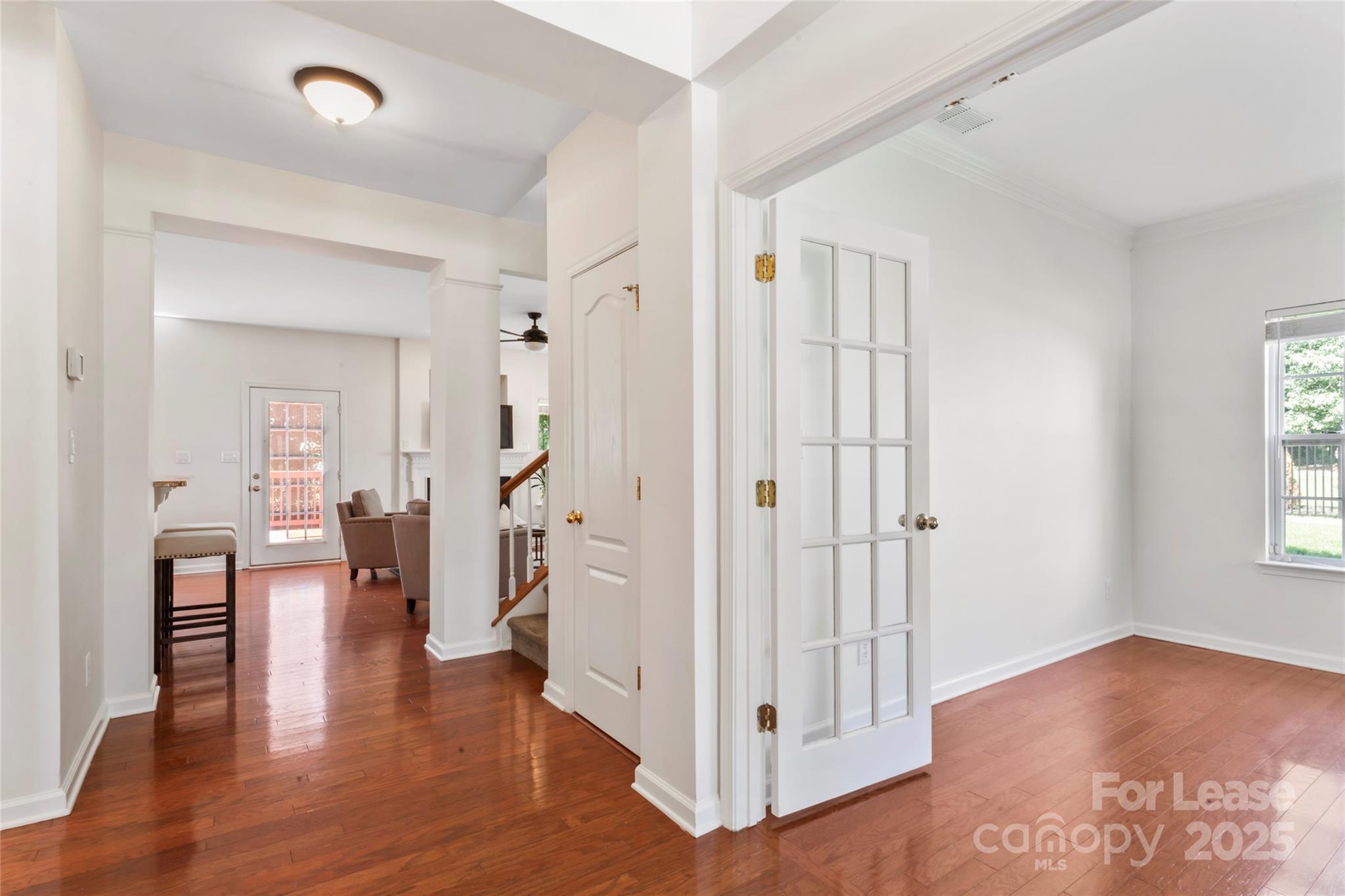 2003 Red Carpet Court Indian Trail, NC 28079 - Photo 17 of 28 wooden floor in an empty room with a window