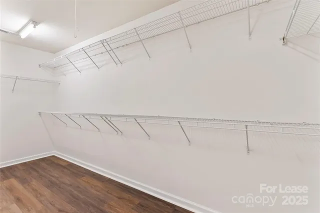 a view of a room with racks on the wall