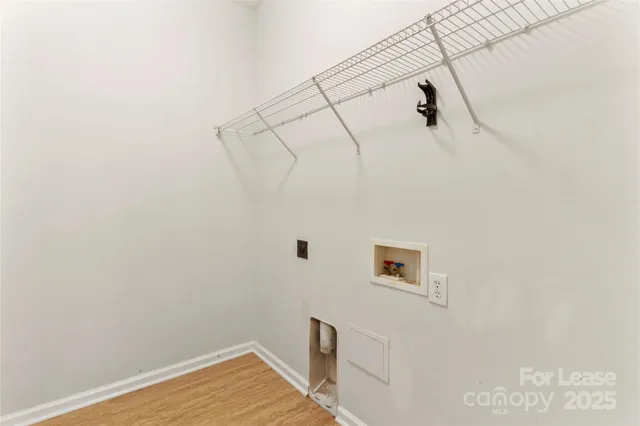 a view of a room with racks on the wall