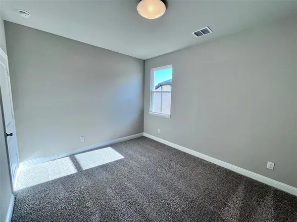 wooden floor and window in a room