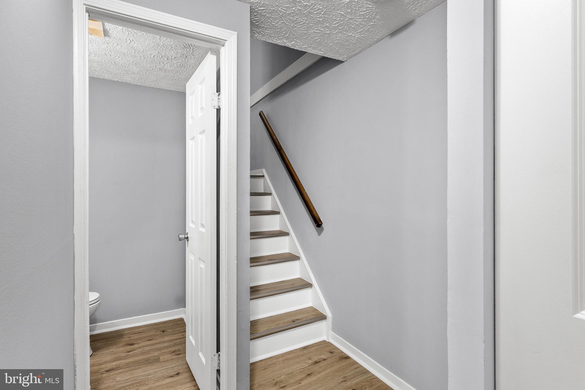 9479 Inaugural Drive King George, VA 22485 - Photo 11 of 26 a view of entryway with wooden floor