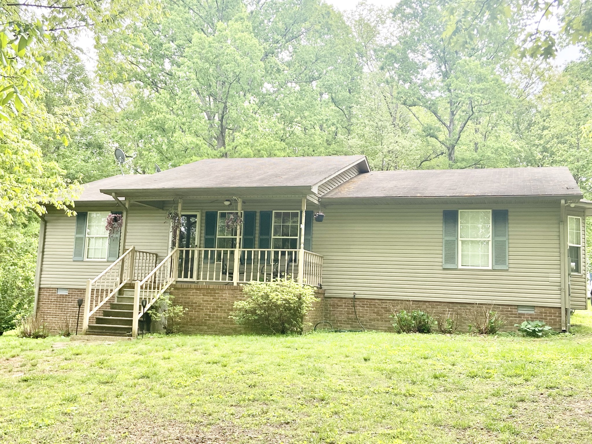 1050 West Point Road Lawrenceburg, TN 38464 - Photo 1 of 17 a view of a house with a yard
