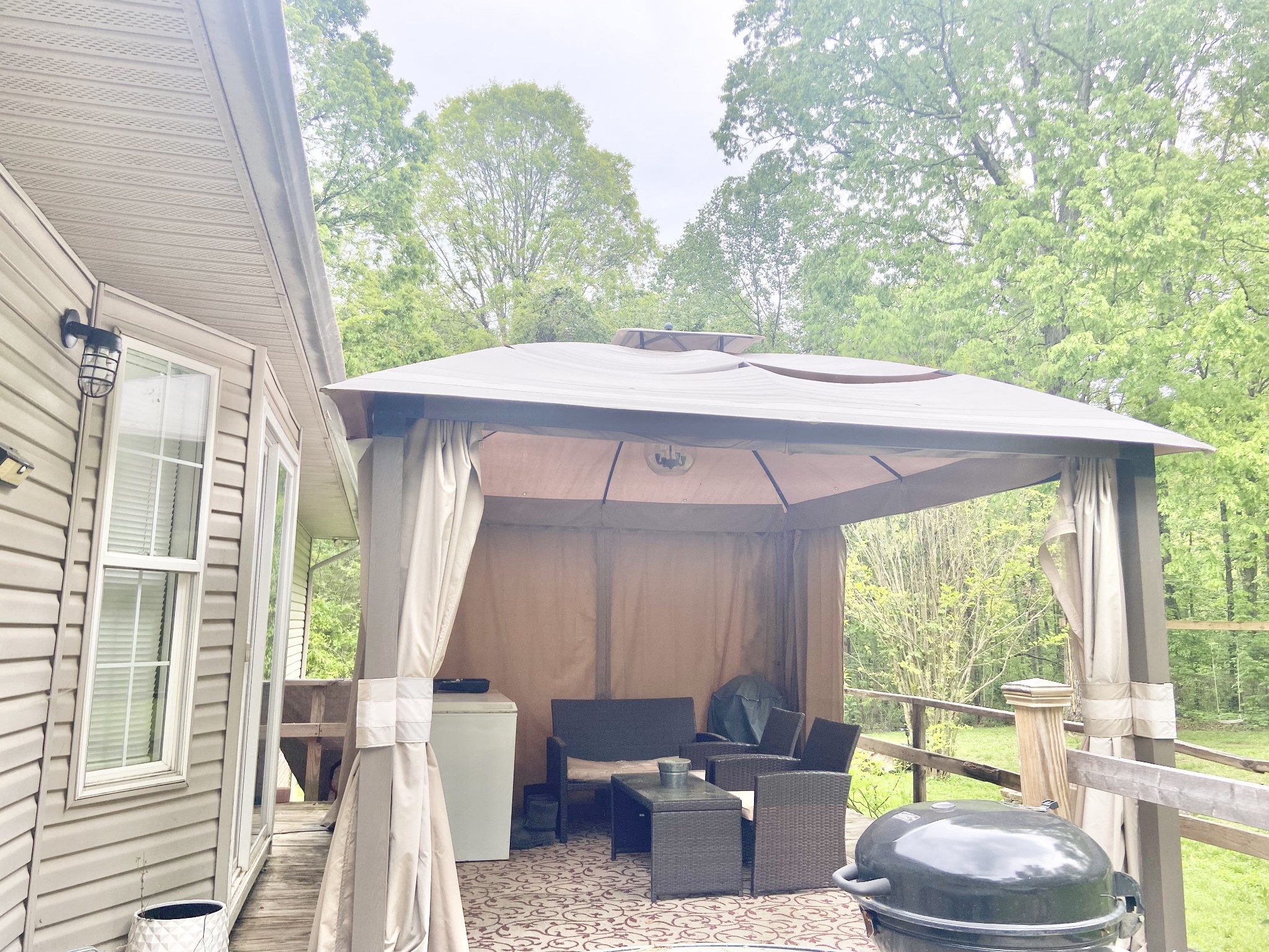 1050 West Point Road Lawrenceburg, TN 38464 - Photo 14 of 17 a patio with table and chairs