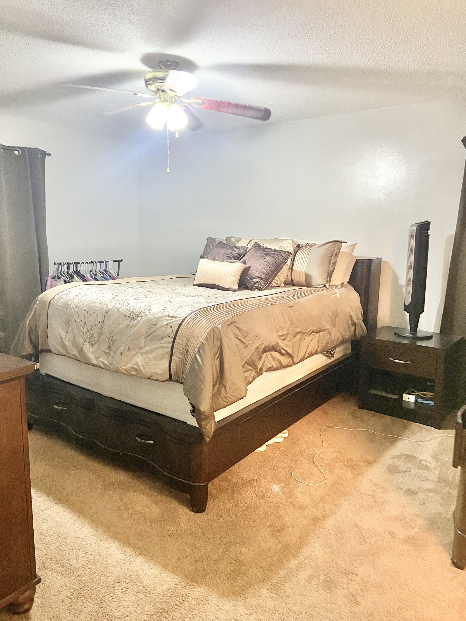 1050 West Point Road Lawrenceburg, TN 38464 - Photo 7 of 17 a bedroom with bed and a chandelier