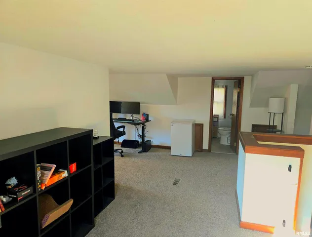 a view of game room with window and equipment