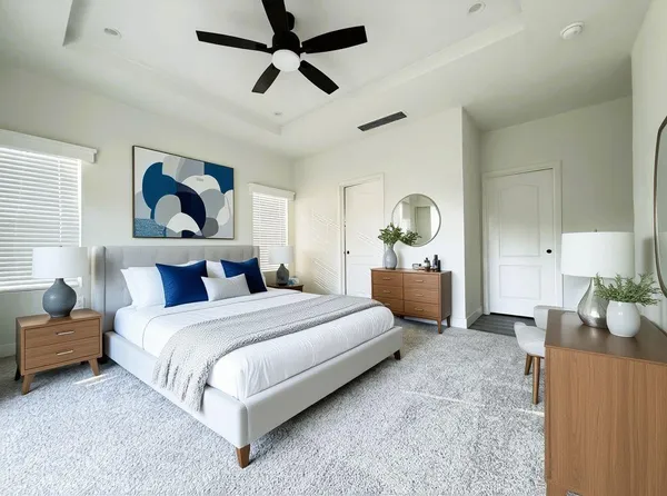 a bedroom with bed and window