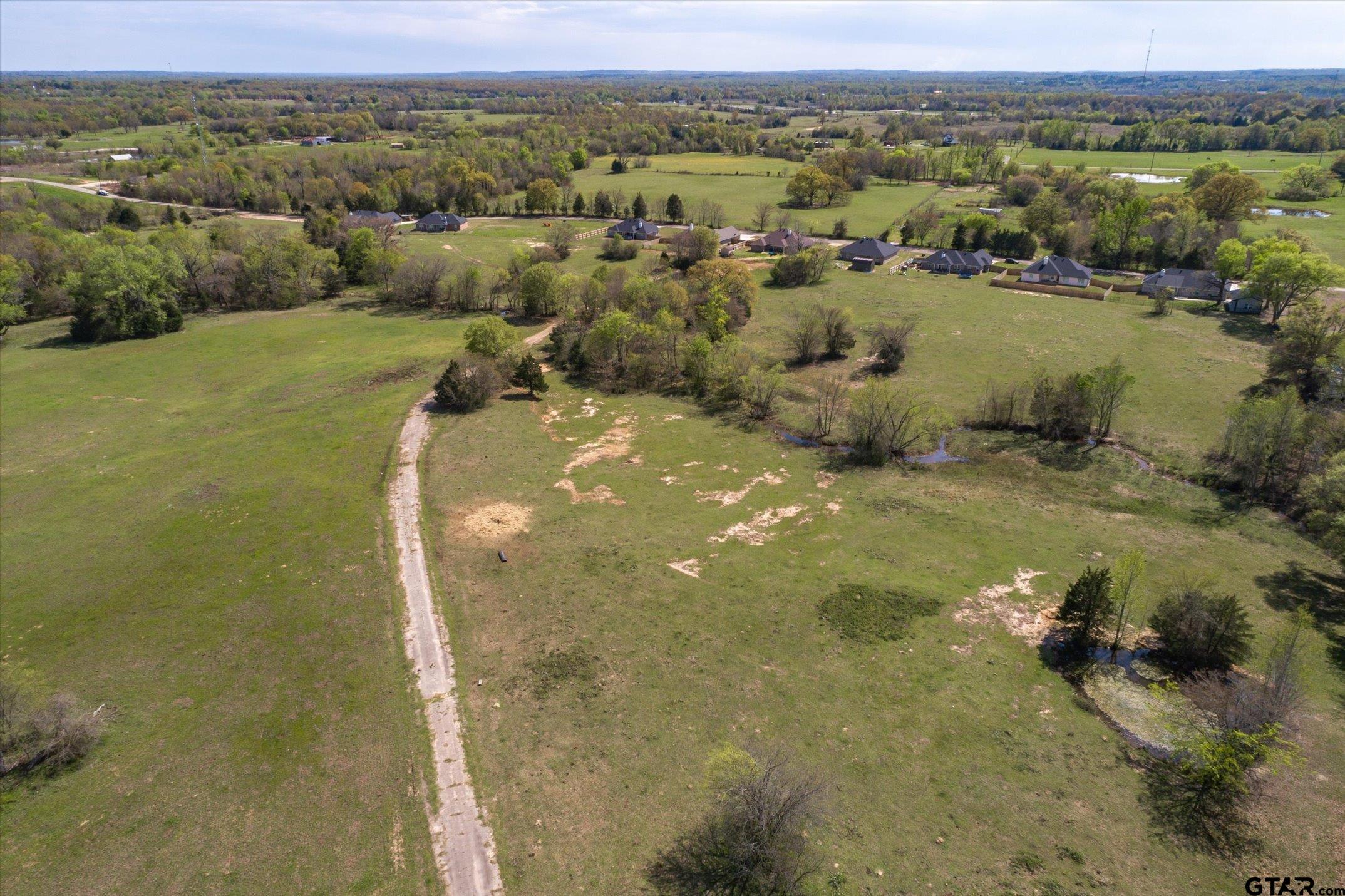 0 Oklahoma Street Van, TX 75790 - Photo 18 of 25 a view of a lake with a mountain in the background