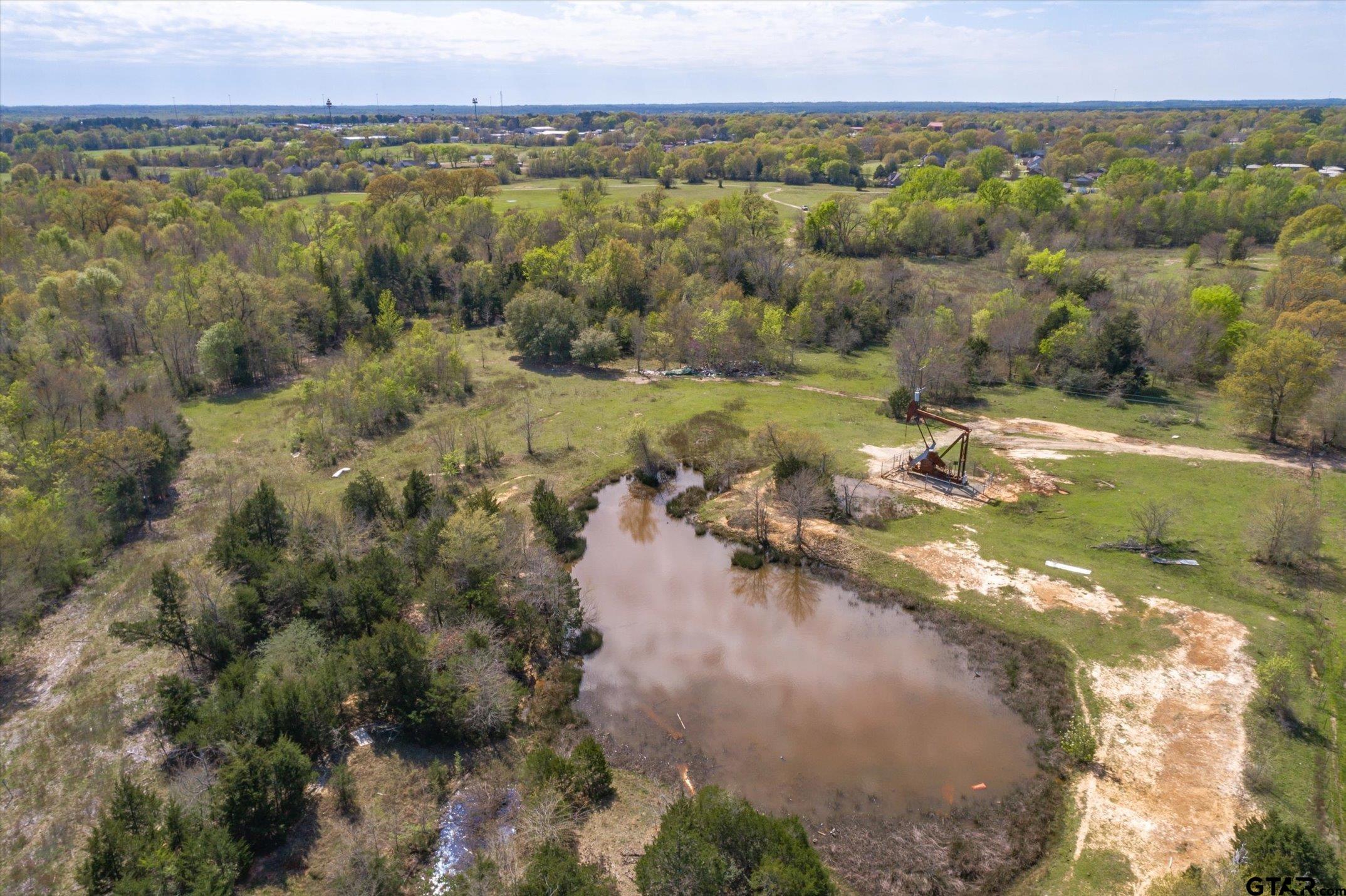0 Oklahoma Street Van, TX 75790 - Photo 20 of 25 a view of a lake with mountains in the background