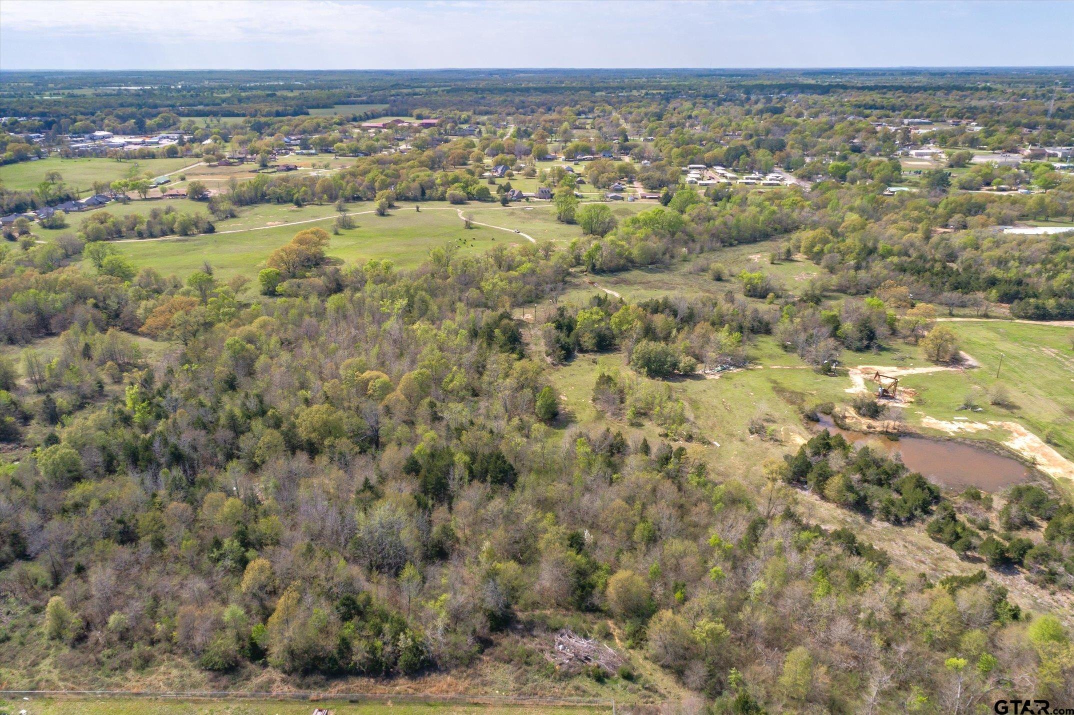 0 Oklahoma Street Van, TX 75790 - Photo 23 of 25 a view of a city with ocean view