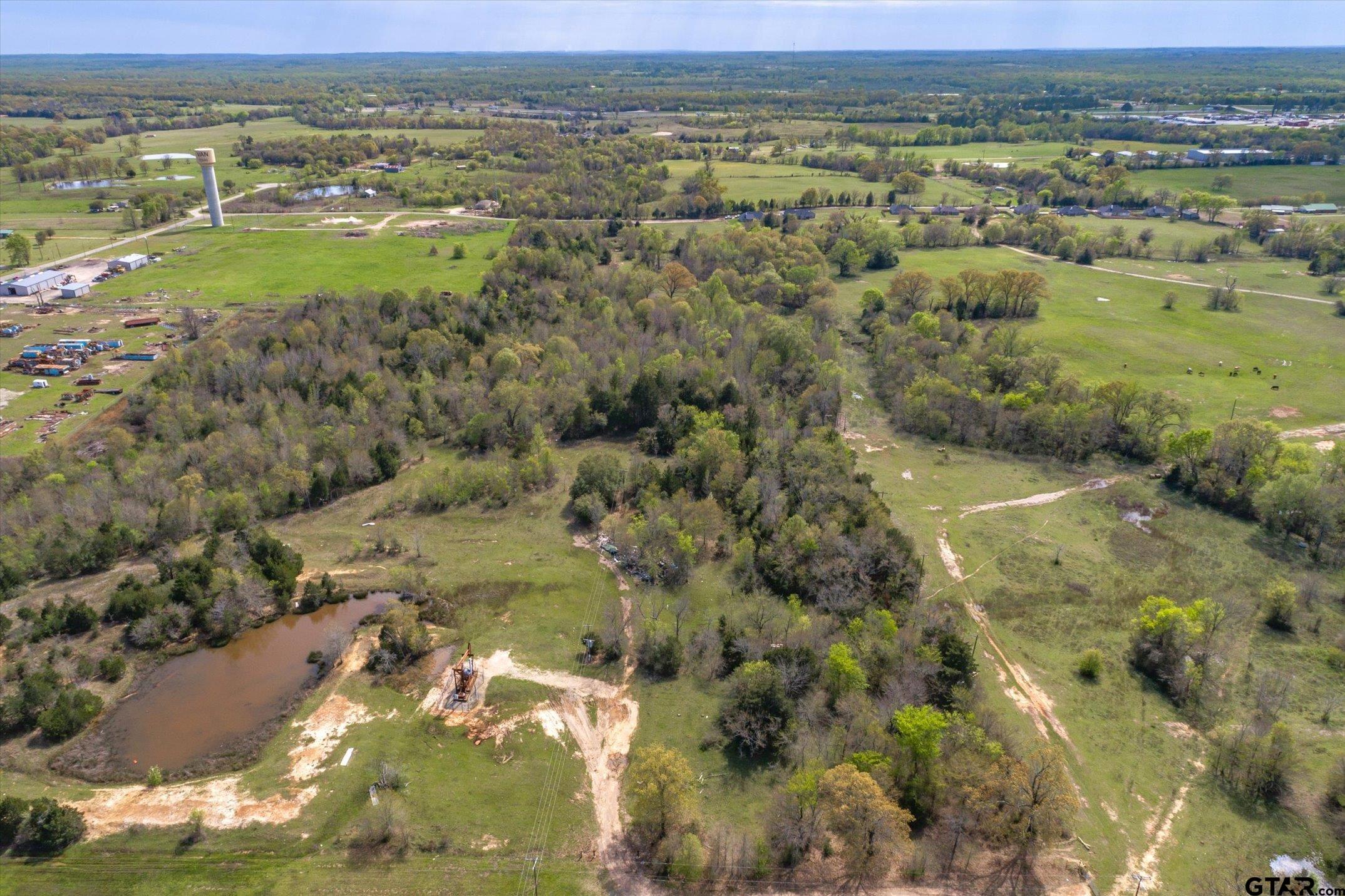 0 Oklahoma Street Van, TX 75790 - Photo 24 of 25 a view of a city with an ocean