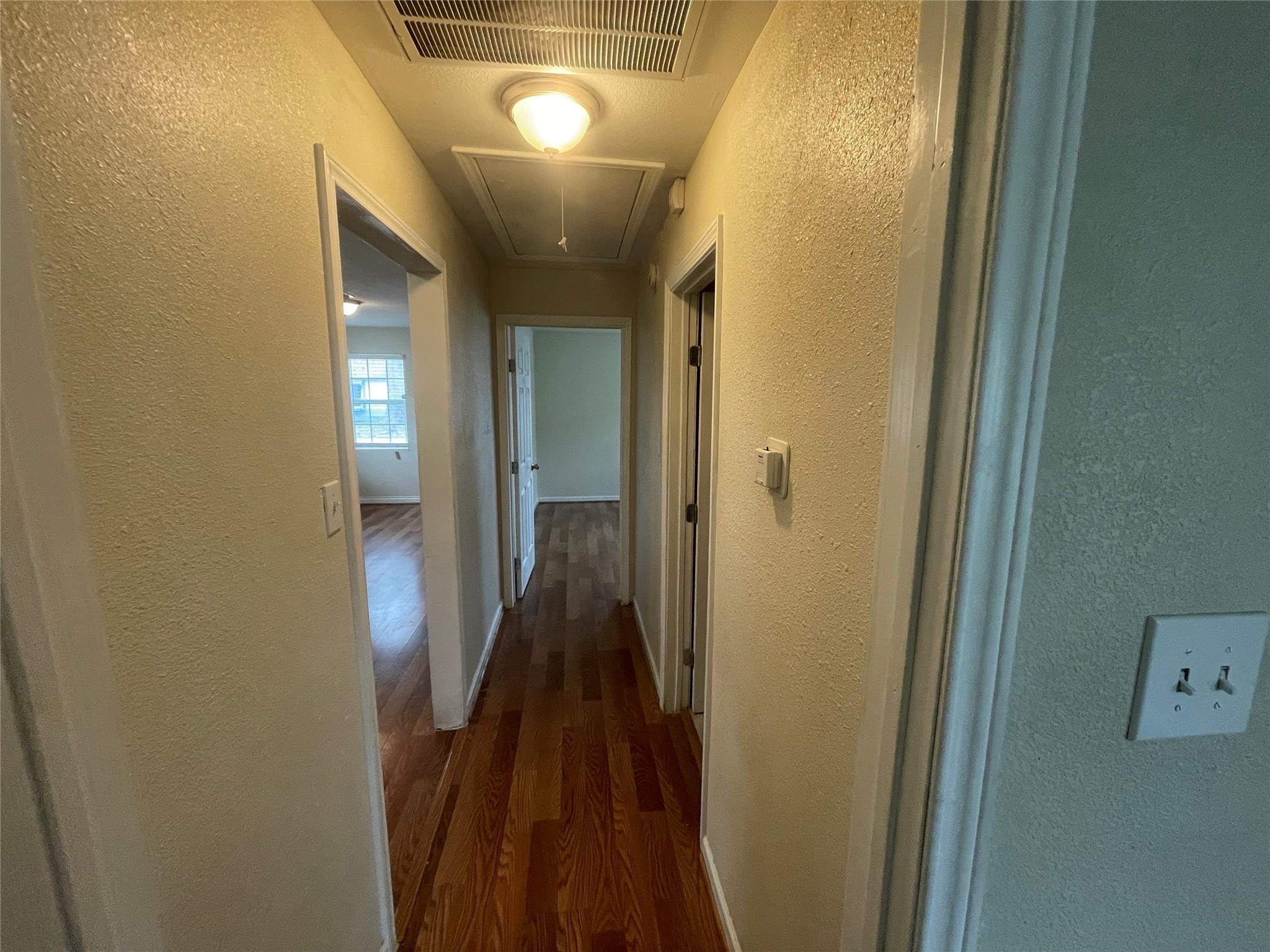 6315 Sayers Street Houston, TX 77026 - Photo 8 of 11 a view of a bathroom from the hallway