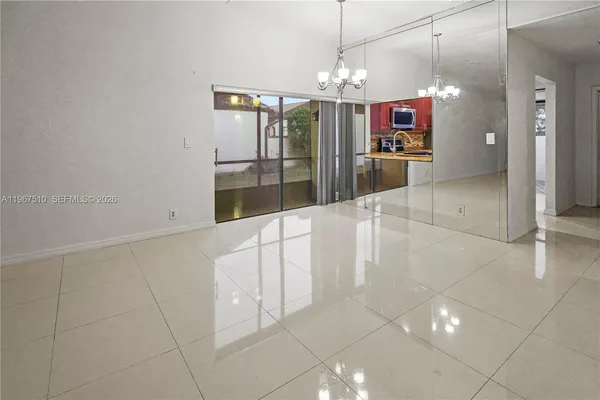 a view of a living room with a chandelier