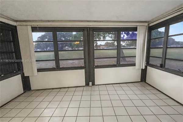 a view of empty room with window
