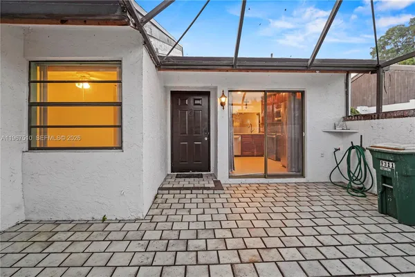 a house view with a outdoor space