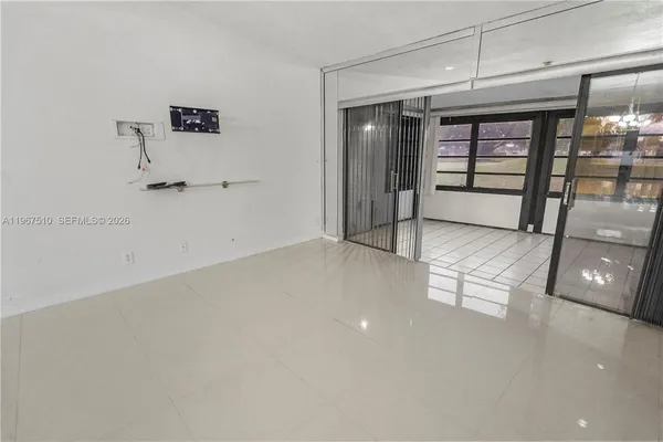 a view of a room with racks on the wall