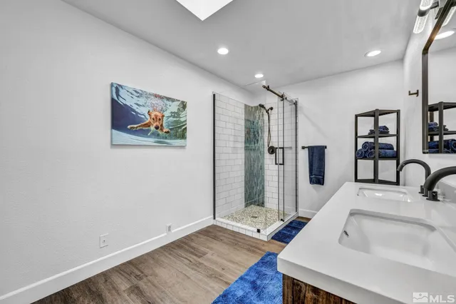 a hallway with a sink and a refrigerator