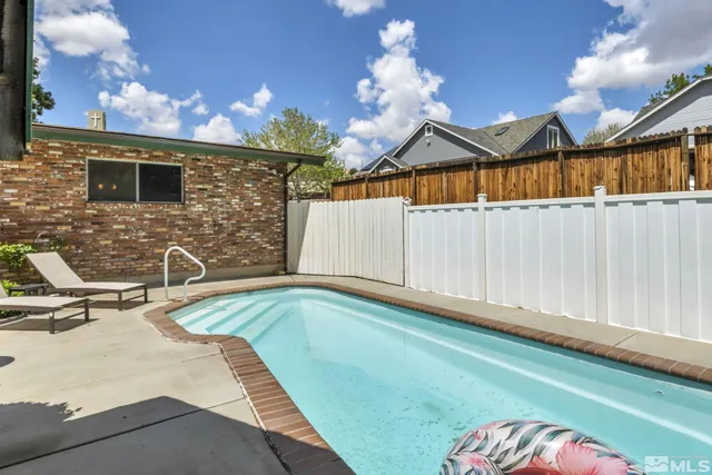 a bathroom with a sink a mirror and a bathtub