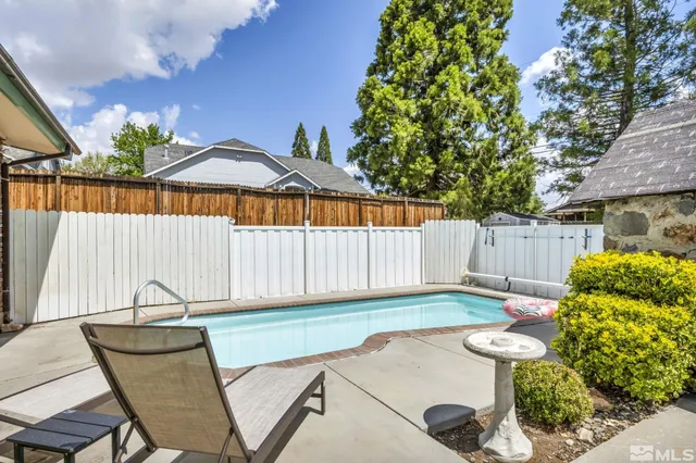 a house view with a garden space