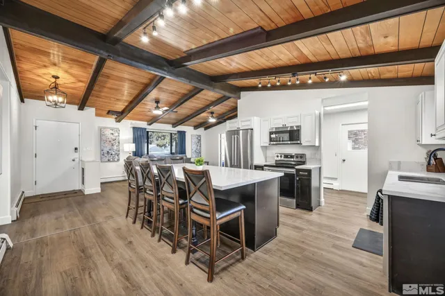 a view of a kitchen and dining room
