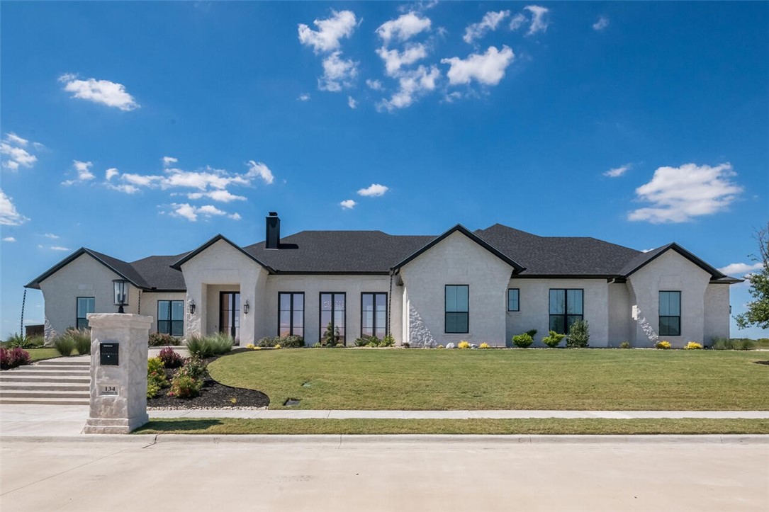 134 Sunflower Street Lorena, TX 76655 - Photo 1 of 86 a view of a house with a big yard and large trees