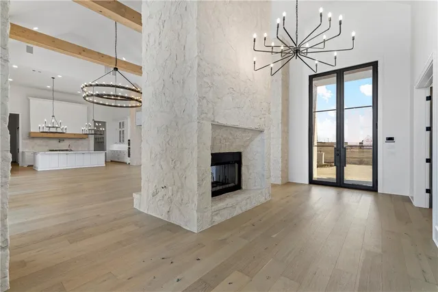 a very nice looking kitchen with a chandelier