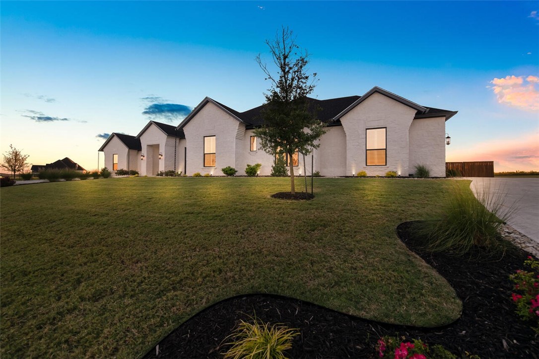 134 Sunflower Street Lorena, TX 76655 - Photo 3 of 86 a front view of a house with garden