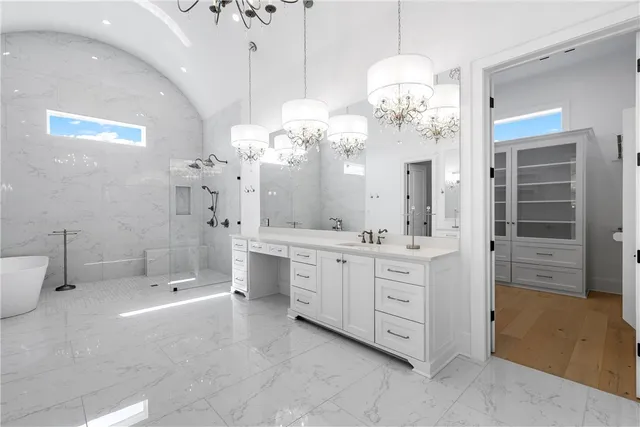 a view of swimming pool with lounge chair