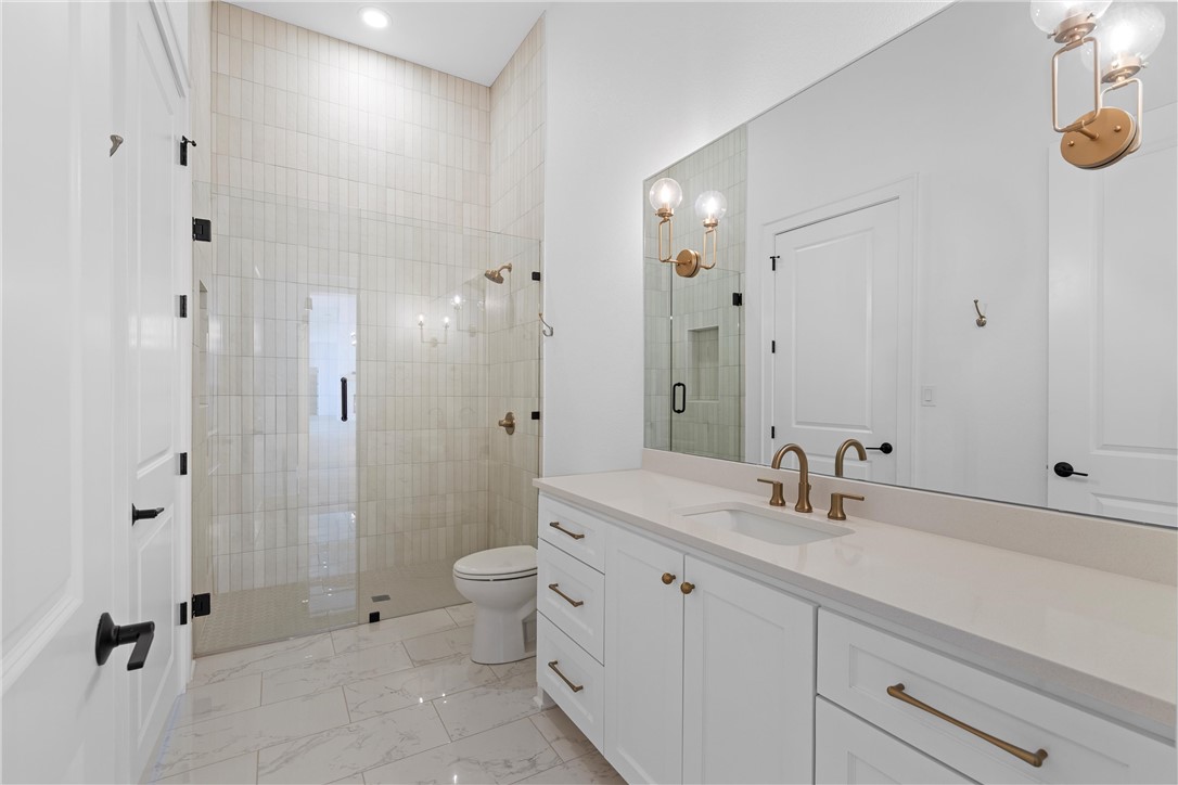 134 Sunflower Street Lorena, TX 76655 - Photo 52 of 86 a bathroom with a double vanity sink mirror and shower