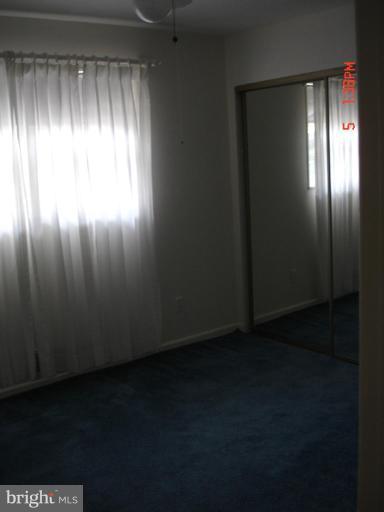 12910 Bluhill Road Silver Spring, MD 20906 - Photo 7 of 10 a view of empty room with window