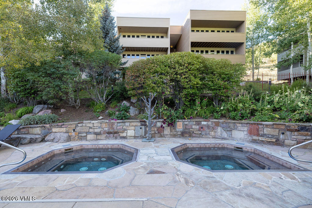 665 North Frontage Road West, Unit 12D Vail, CO 81657 - Photo 22 of 24 2609_sun_vail_12d_exterior_pool_c