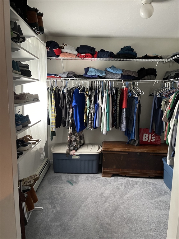 515 Kennedy Street Fall River, MA 02721 - Photo 23 of 34 a view of walk in closet with clothes and shoes