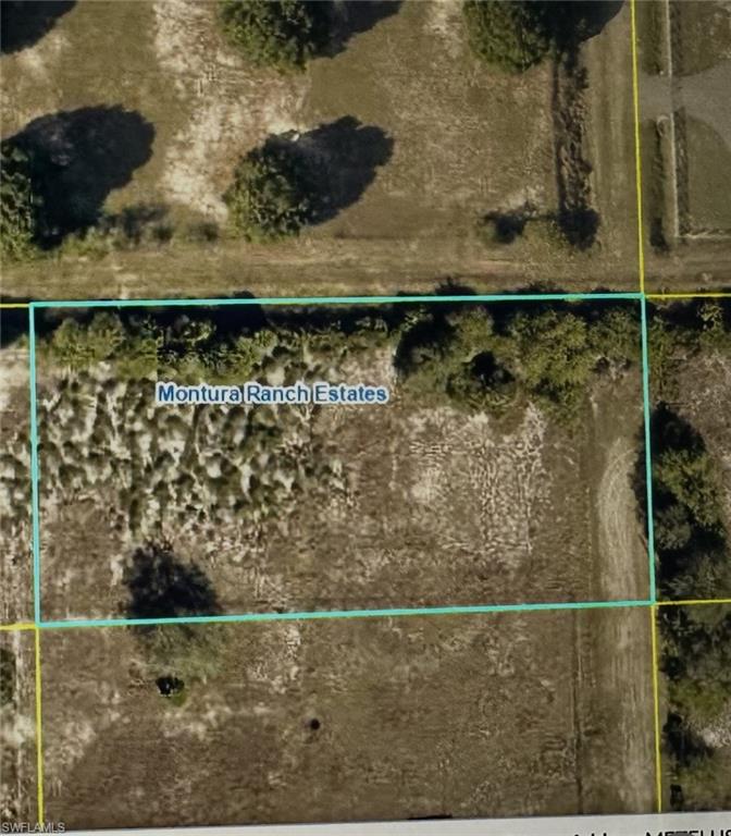 580 North Estribo Street Clewiston, FL 33440 - Photo 2 of 3 a view of wooden floor