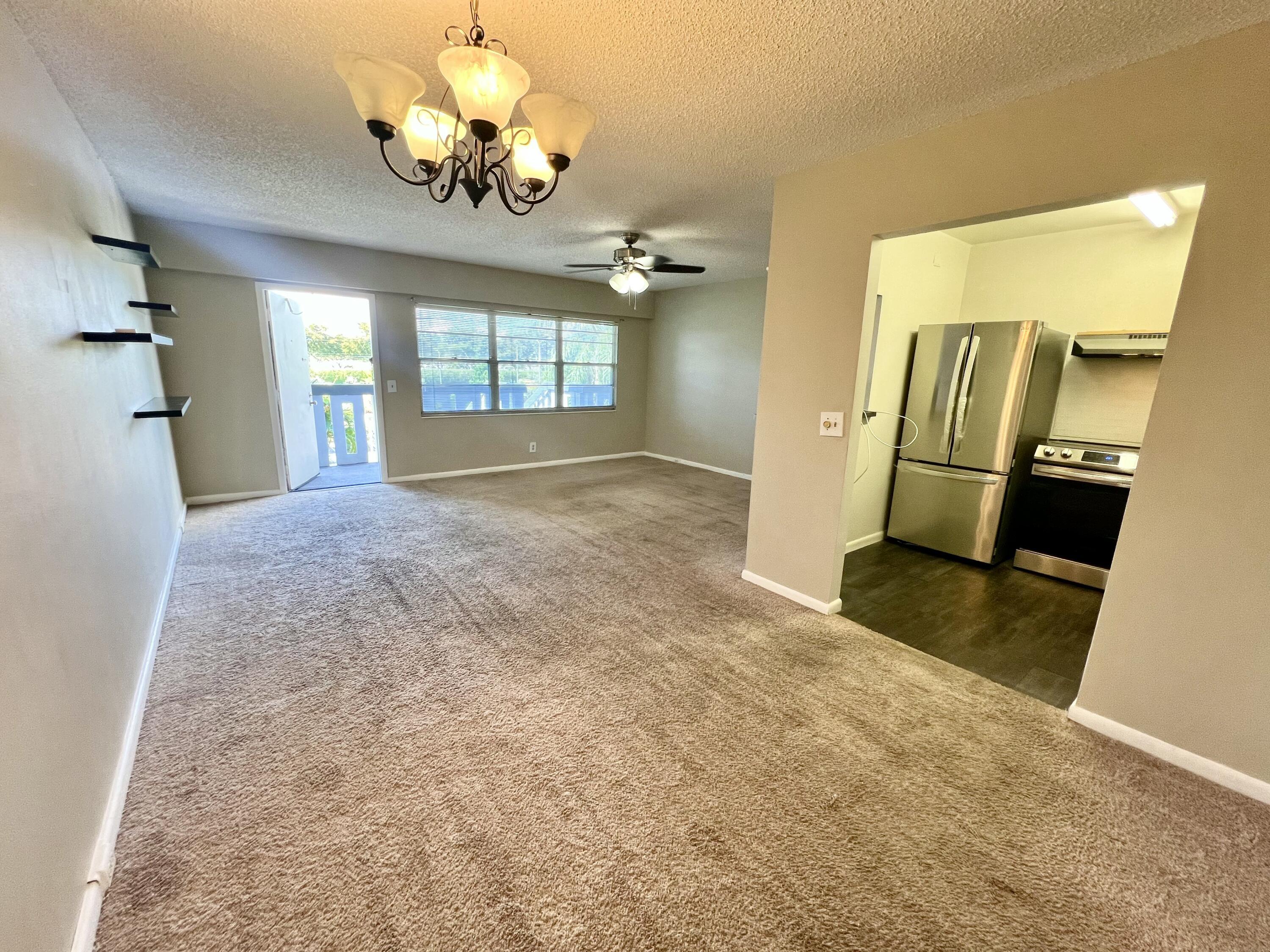 209 Suffolk F Boca Raton, FL 33434 - Photo 10 of 25 Dining Area/Entry/Living Area