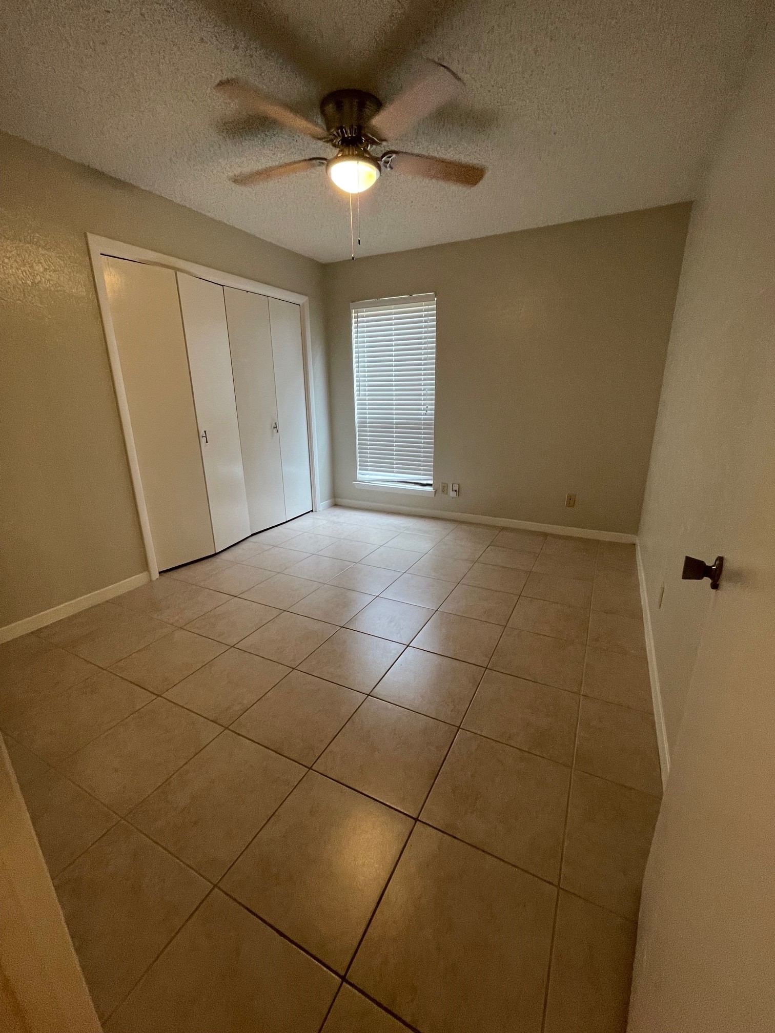 1411 Waterloo Trail, Unit B Austin, TX 78704 - Photo 11 of 15 a view of an empty room with a window