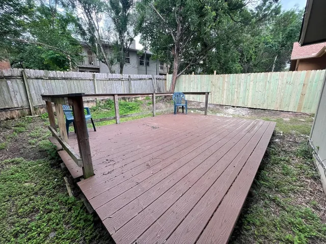 a view of outdoor space with wooden deck