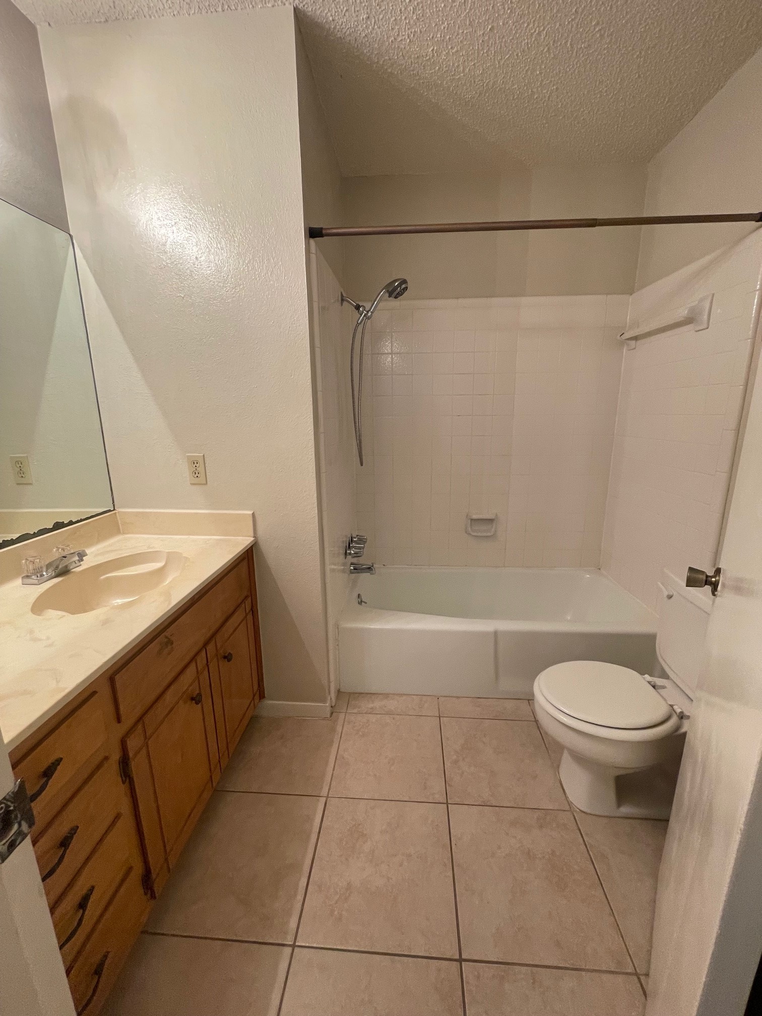 1411 Waterloo Trail, Unit B Austin, TX 78704 - Photo 10 of 15 a bathroom with a sink a toilet and shower