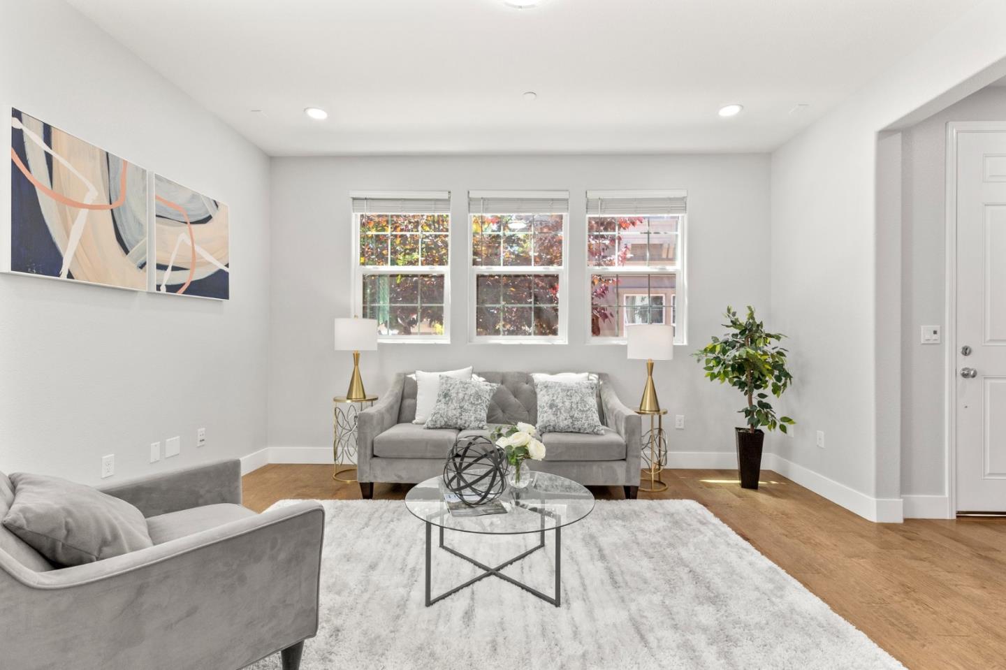 24253 Nora Circle Hayward, CA 94545 - Photo 1 of 49 a living room with furniture and potted plant