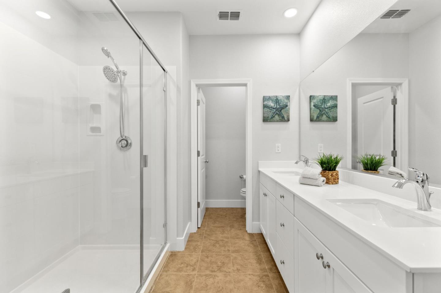 24253 Nora Circle Hayward, CA 94545 - Photo 17 of 49 a bathroom with a double vanity sink and mirror