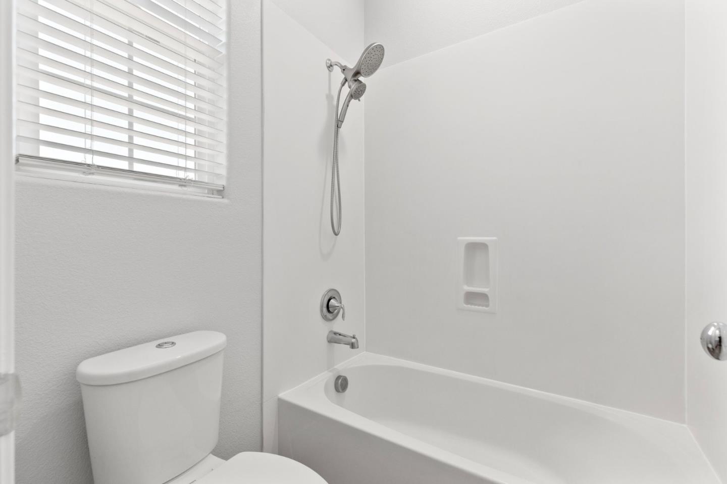 24253 Nora Circle Hayward, CA 94545 - Photo 24 of 49 a white bath tub sitting next to a toilet