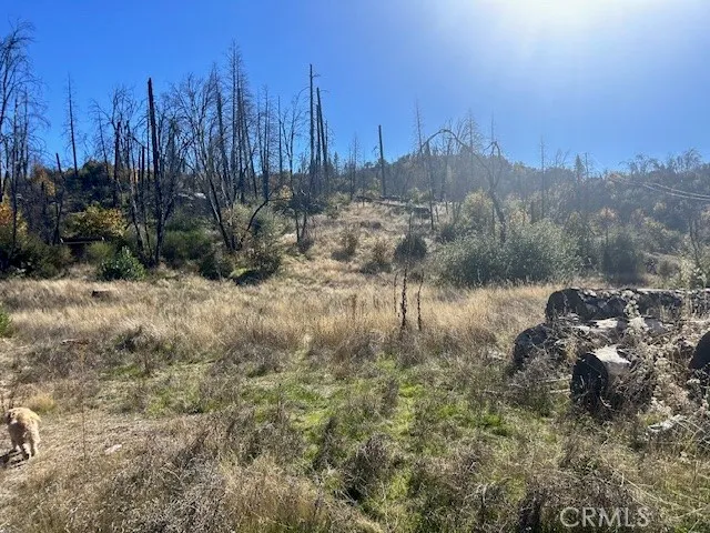 a view of a town with mountains in the background