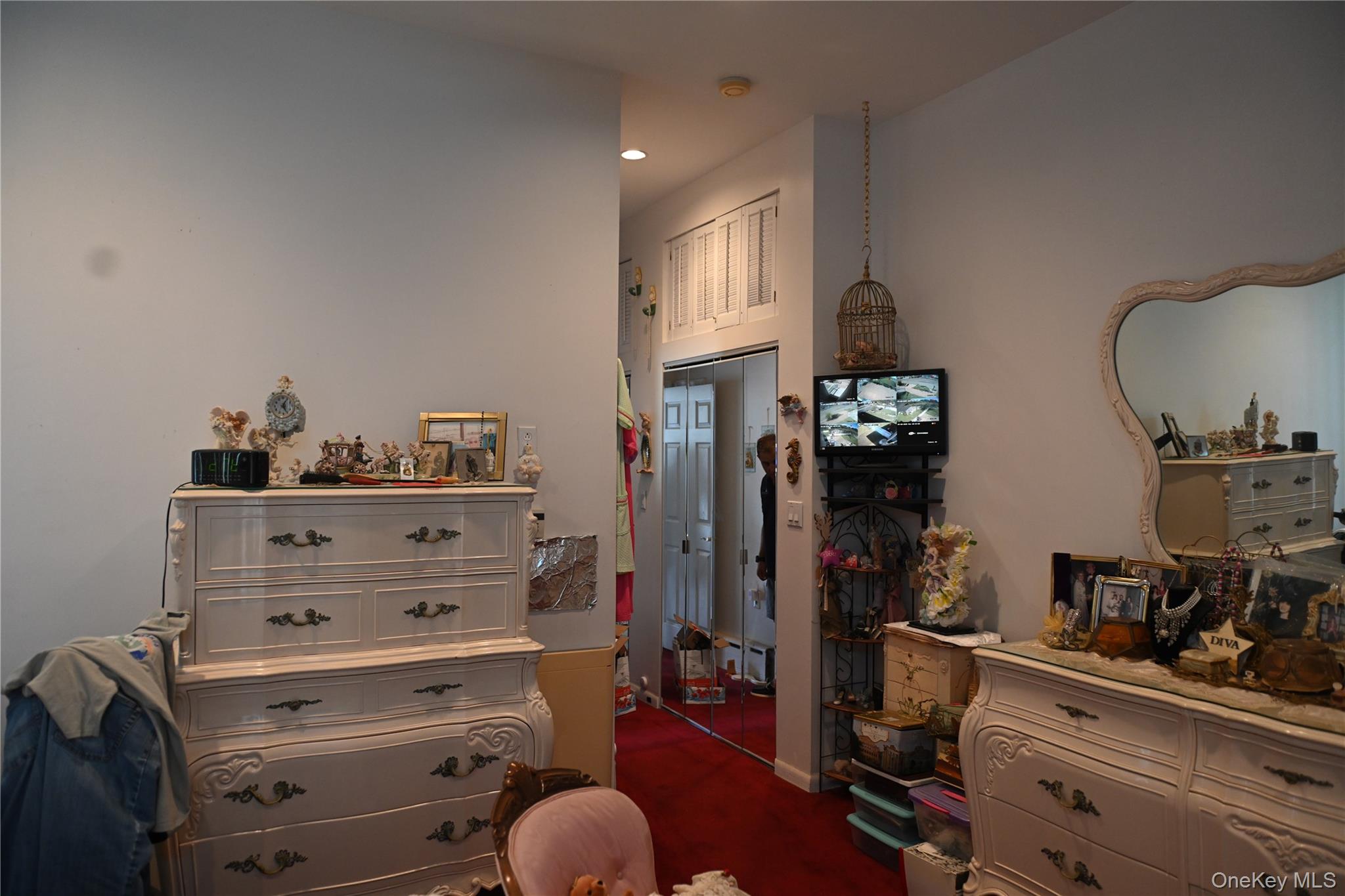 115 Riviera Drive Mastic Beach, NY 11951 - Photo 13 of 27 a bedroom with a bed and wooden floor