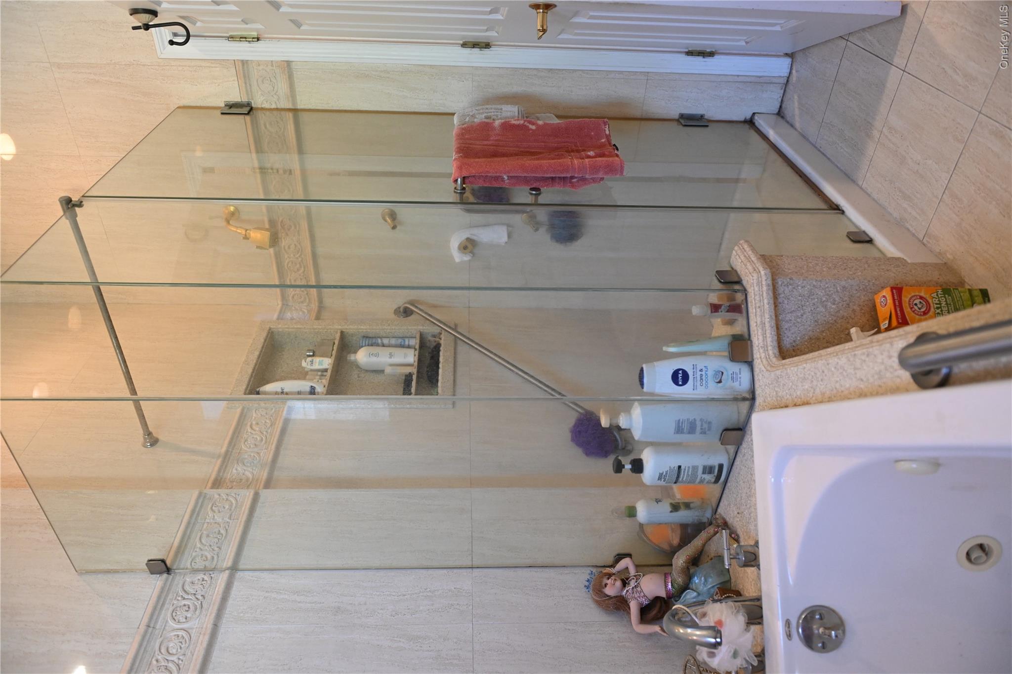 115 Riviera Drive Mastic Beach, NY 11951 - Photo 16 of 27 Full bath with a stall shower, a jetted tub, and tile patterned flooring